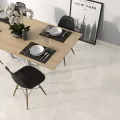 Biela gresová dlažba LAVI Blanco 60x60 s lesklým povrchom v dekore mramoru v interiéri v pracovni