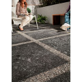 protišmyková tmavá terrazzo gresová dlažba NORR SVART 60x60 R11 od MIRAGE na terase