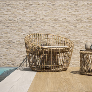 Fasádny obklad CANON ARENA 17×52 s kamenným vzhľadom v pieskových odtieňoch.